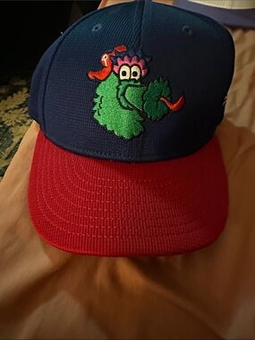 Phillies New Era Blue and Red Snapback Hat with Green Mascot Embroidery